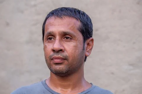 A Middle Aged Man with a Serious Expression Outdoors Stock Photos