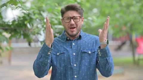 Middle Aged Man with Shocked Expression Outdoors Video stock 311376117