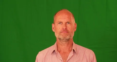 Middle aged man showing he is astonished or surprised, green screen Stock Footage 94218653