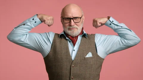 Middle-Aged Man Shows Off Biceps in Stylish Attire with Beard and Glasses Stock Footage 260421180