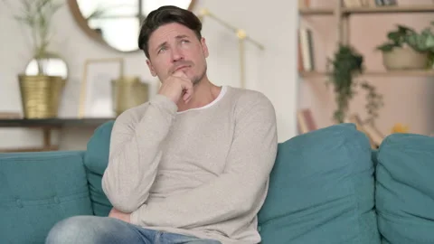 Middle Aged Man Sitting and Thinking , at Home Stock Footage 142378295
