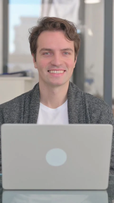 Middle Aged Man Smiling at Camera at Work, vertical video Stock Footage 324792703