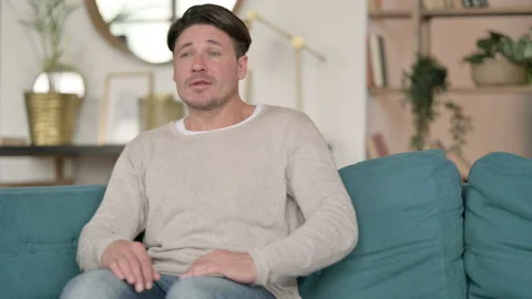 Middle Aged Man Standing up Going Away, at Home Video stock 142366005