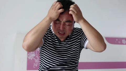 Middle-aged man suffering from dizziness and mental breakdown due to stress Stock Footage 295854029