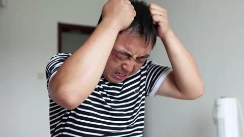 Middle-aged man suffering from high blood pressure, headache and dizziness Stock Footage 257752901