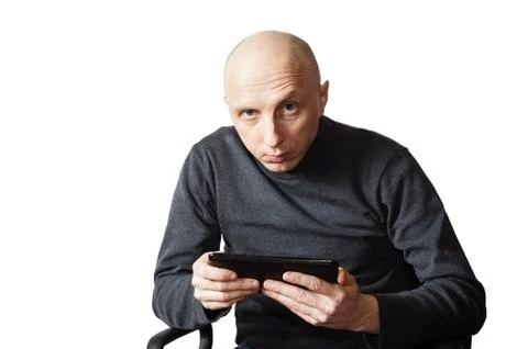 Middle aged man with tablet computer in hands Stock Photos