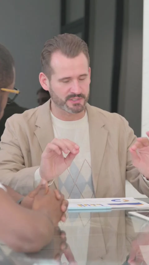 Middle Aged Man Talking During Meeting, vertical video Stock Footage 324713569