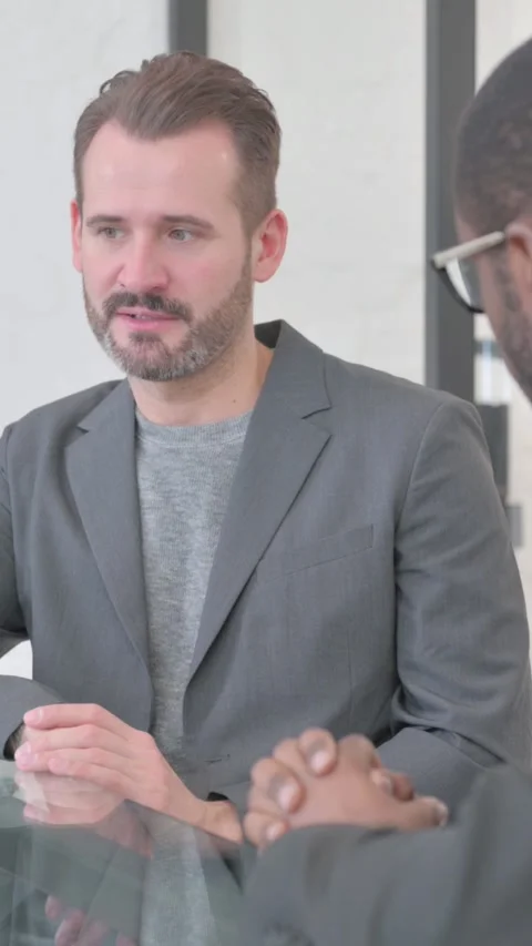 Middle Aged Man Talking with Teammate, vertical video Stock Footage 324698037