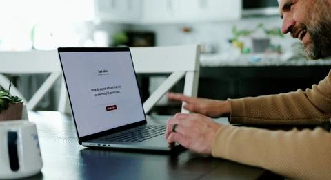 Middle Aged Man Testing Dad Joke Generator Website Stock Photos