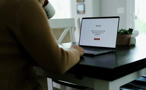 Middle Aged Man Testing Dad Joke Generator Website Stock Photos