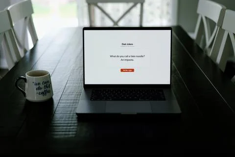 Middle Aged Man Testing Dad Joke Generator Website Stock Photos