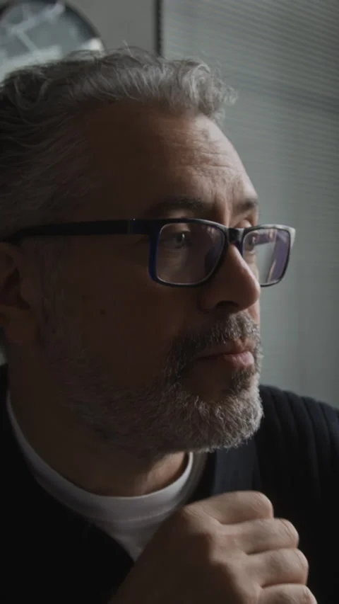 Middle Aged Man Thinking Deeply with Hand on Chin in Office Stock Footage 346874327
