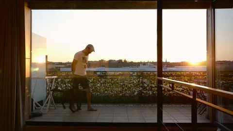 Middle-aged man training obedience playing with his dog Stock Footage 127588414