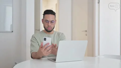 Middle Aged Man Using Multiple Devices for Work 스톡 동영상 307915619