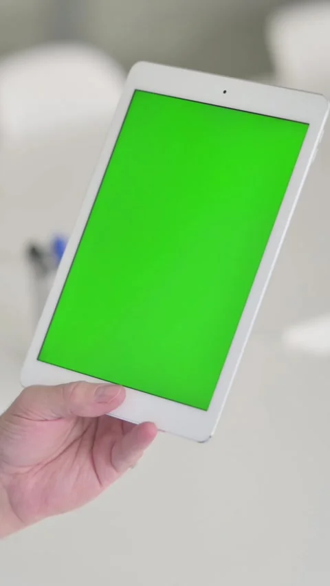 Middle Aged Man using Tablet with Green Chroma Screen, Vertical Video Stock Footage 339584246