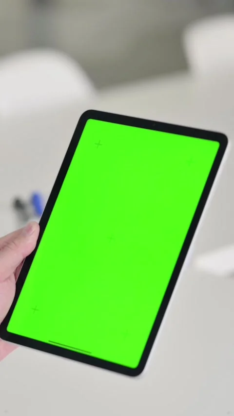 Middle Aged Man using Tablet with Green Chroma Screen, Vertical Video 動画素材 339584262