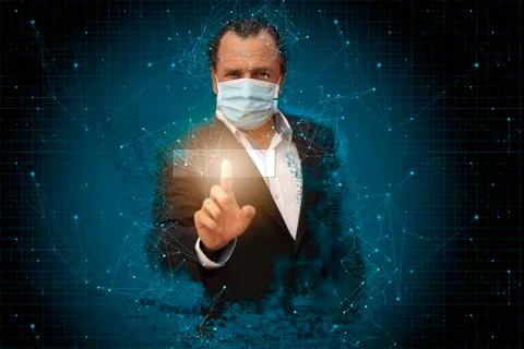 Middle-aged man in virtual technological environment, touches screen with his Stock Photos