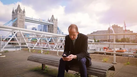 Middle aged man walking around London England Video stock 293992145