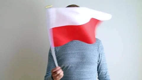 Middle aged man is waving the flag of Poland. Stock Footage 240108344