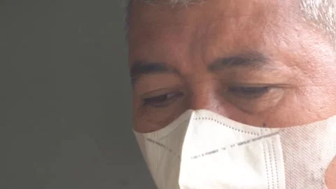 A middle-aged man wearing a face mask. Stock Footage 287329206