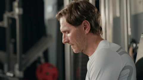 Middle Aged Man Wiping Sweat with Towel after Workout in Gym Stock Footage 345203413