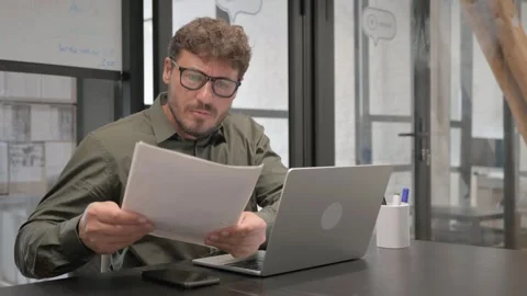 Middle Aged Man Working on Business Report with Laptop 스톡 동영상 307199193