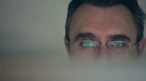 Middle-aged man working on a computer HD shot with slider Stock Footage 39489740