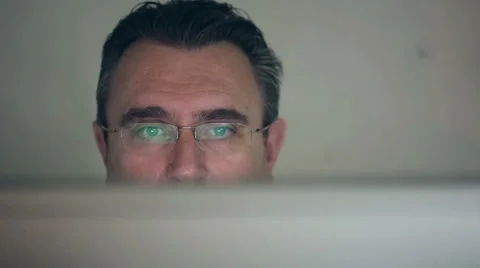 Middle-aged man working on a computer HD shot with slider Stock Footage 39489845