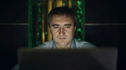 A middle aged man working at a computer in the lab. Dolly shot. Stock Footage 42044870