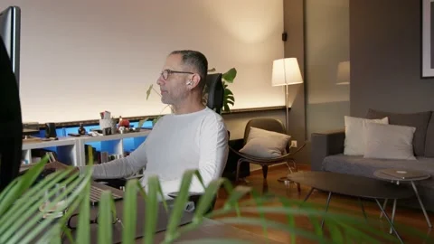 Middle-aged man working from home Stock-Footage 220464151