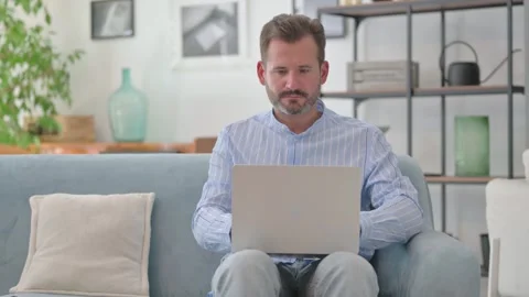 Middle Aged Man Working on Laptop in Lap 스톡 동영상 287897745