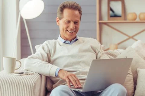 Middle aged man working Stock Photos