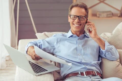 Middle aged man working Stock Photos