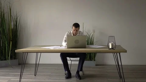 Middle-aged man works in the office with documents Stock-Footage 110938265