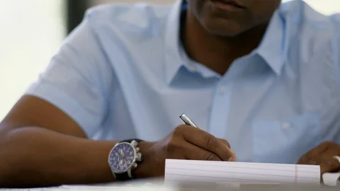 Middle-aged man writing. Stock-Footage 88367943