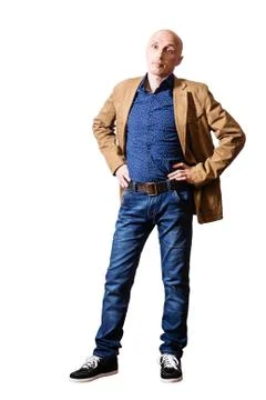 Middle aged man in a yellow jacket and blue jeans Stock Photos