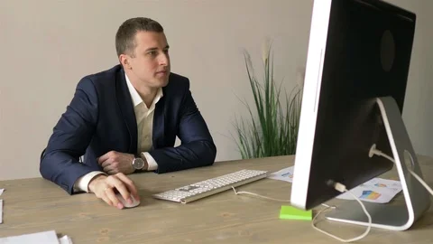 Middle-aged manager working at the computer Stock Footage 110942971