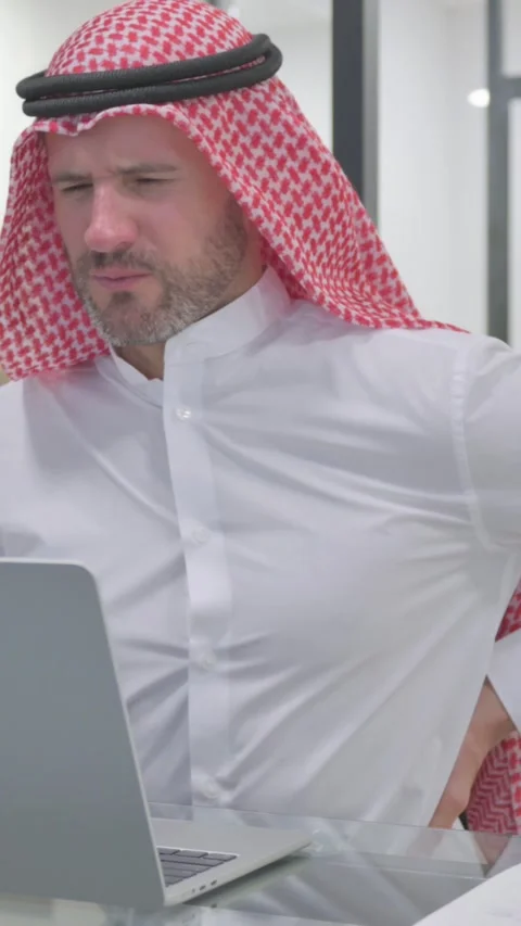 Middle Aged Muslim Man having Spinal Spasm at Work, vertical video Stock Footage 324777425