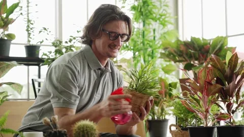 Middle aged or mature man planting tree at home, Aging society Stock-Footage 139327989