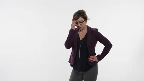 Middle aged professional struggles to cope with a stressful concept Stock Footage 153447842