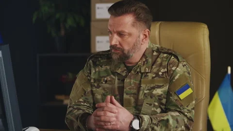 Middle-aged Ukrainian army general controlling special operation on computer 動画素材 335537838