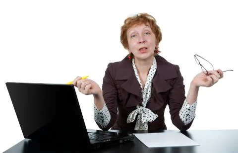 Middle-aged woman at a computer Stock Photos
