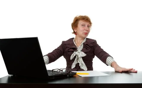 Middle-aged woman at a computer Stock Photos