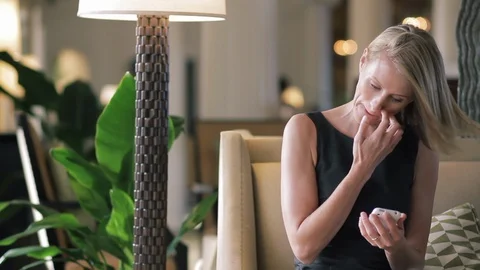 Middle-aged woman using a smart phone. 스톡 동영상 88368657