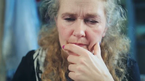 Middle-aged woman working on a computer Stock Footage 98635377