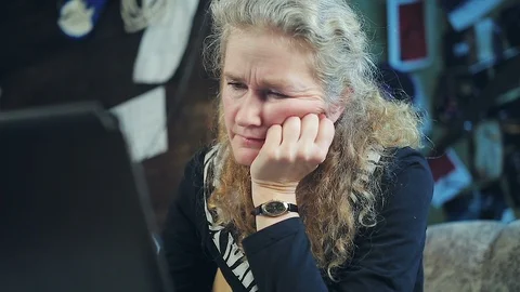 Middle-aged woman working on a computer Stock Footage 102153581