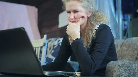 Middle-aged woman working on a computer Stock Footage 150432064
