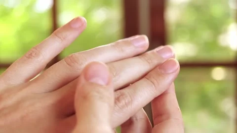 Middle aged woman’s hands with visible skin texture, close-up Stock Footage 346225089