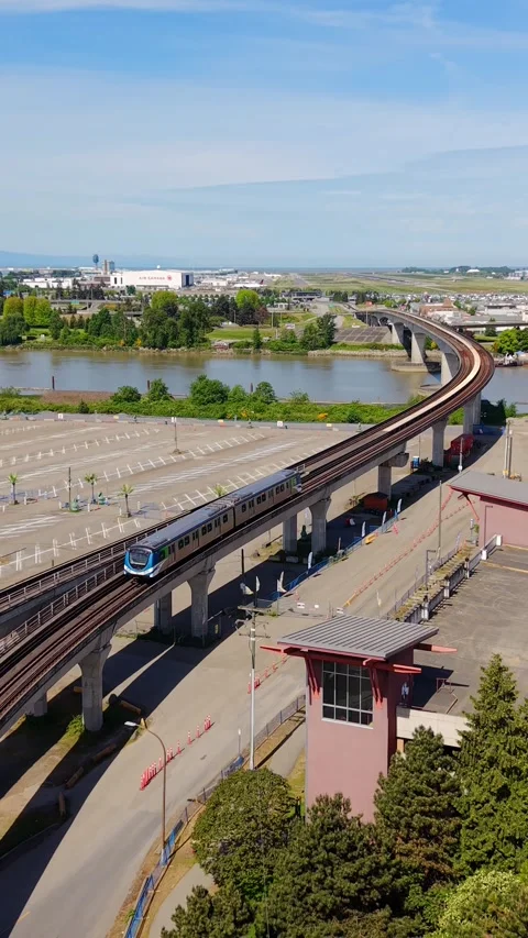 Middle Arm Bridge SkyTrain Crossing The Fraser River - Richmond - British 스톡 동영상 338071054