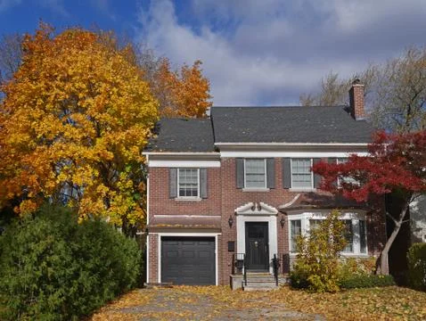 Middle class two storey brick hous Stock Photos